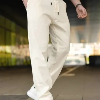 Pánské krémové lněné kalhoty s kapsami, gumou a tkaničkami v pase 4