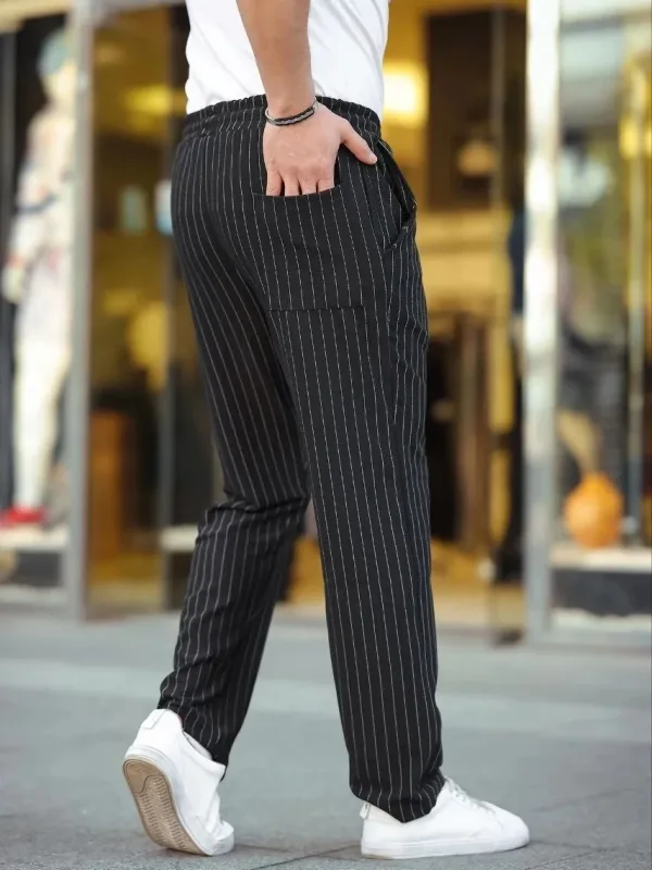 Muške crne prugaste jogger pantalone od krep tkanine 2
