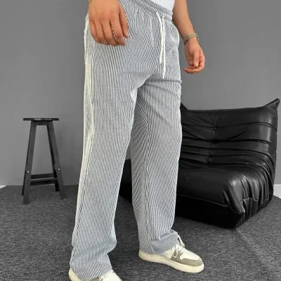 Muške sive ljetne pantalone sa prugama i džepovima 3